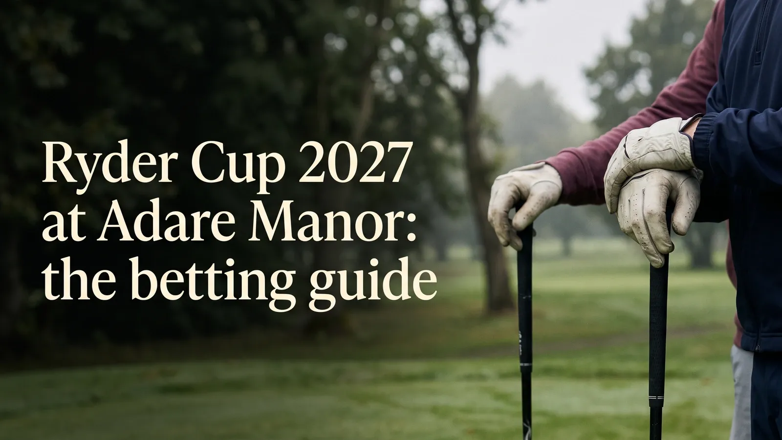 Two cropped golfers in burgundy and navy rest gloved hands on separate upright golf clubs beside a softly blurred, tree-lined parkland course.